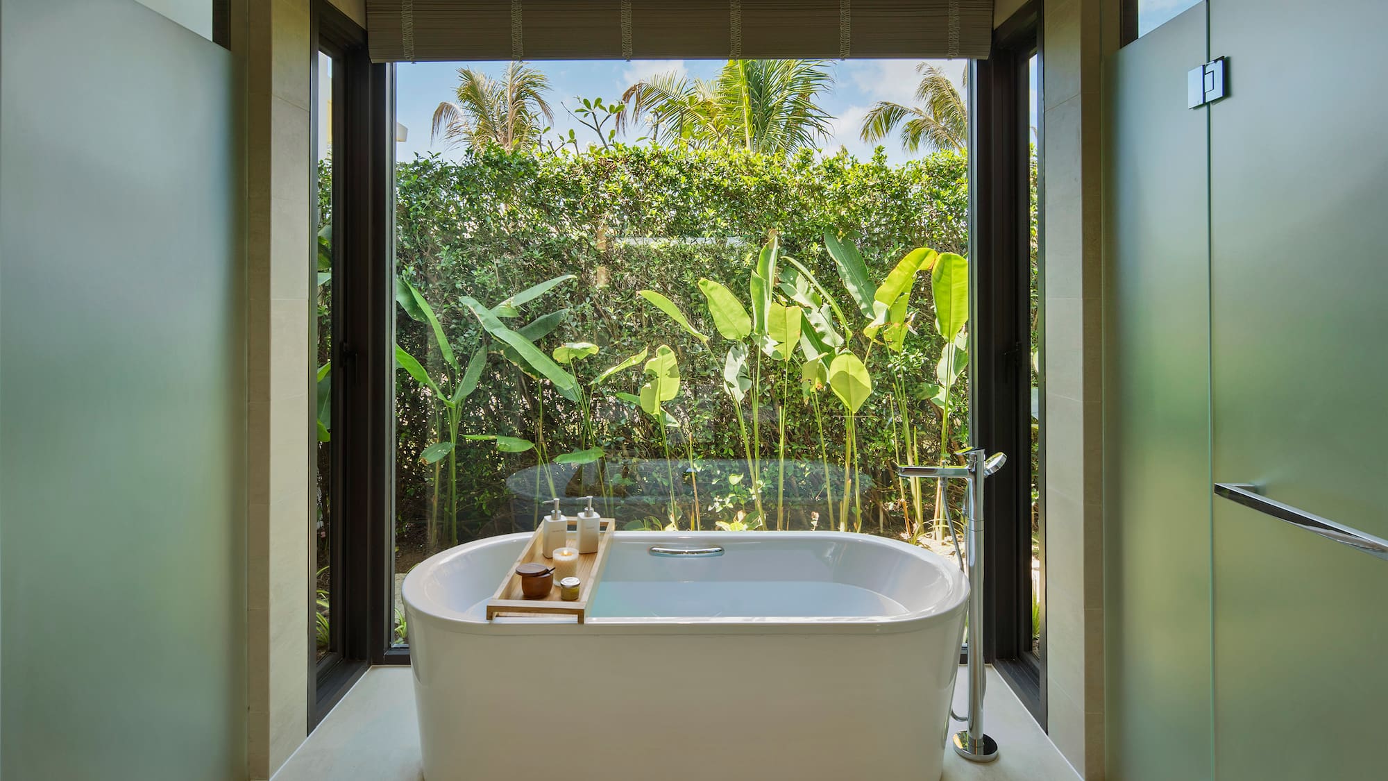 a bathtub in a bathroom with a window