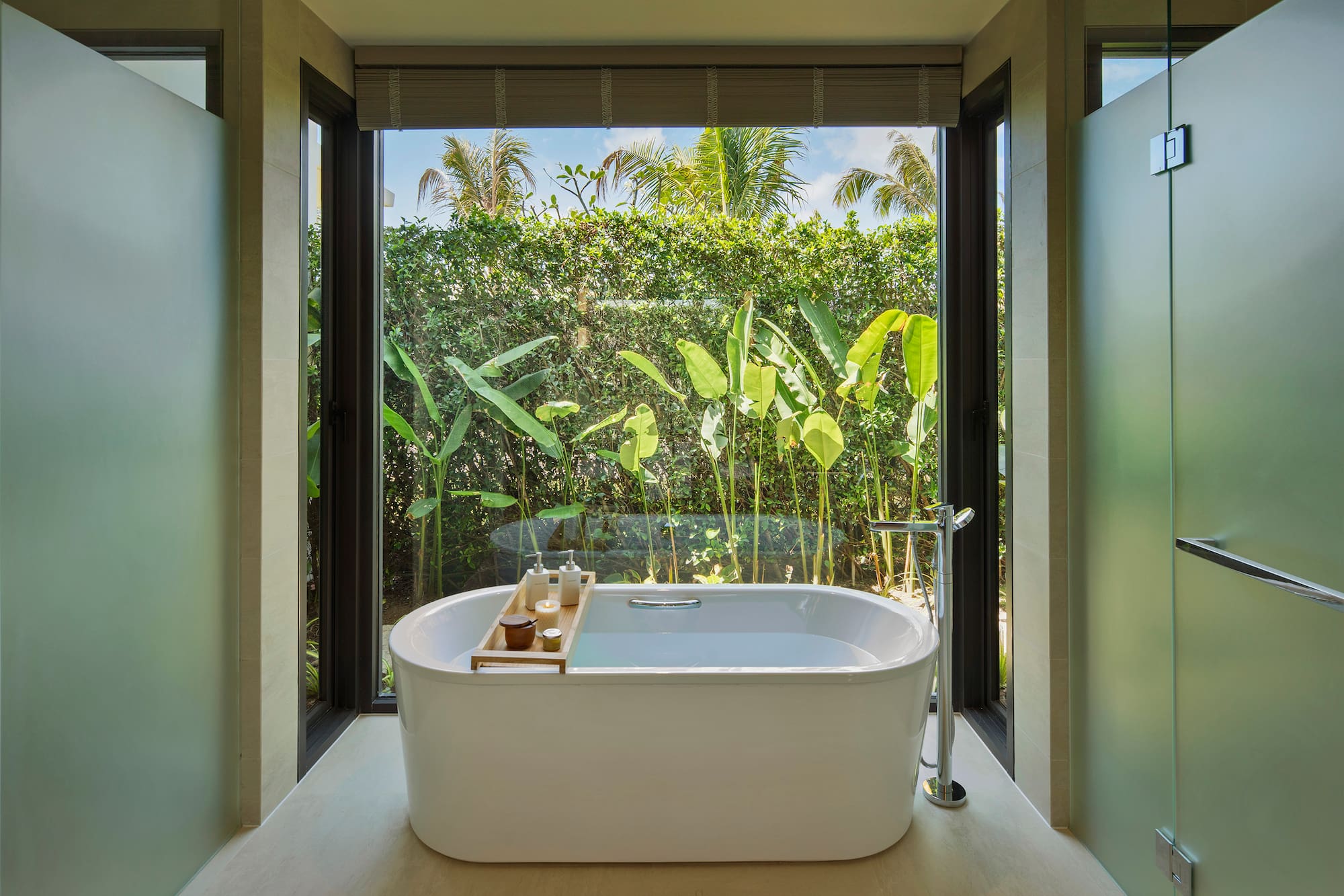 a bathtub in a bathroom with a window