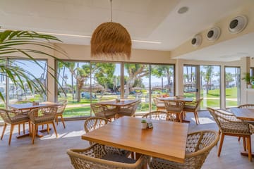 a room with tables and chairs