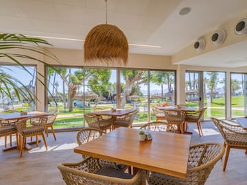 a room with tables and chairs