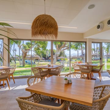 a room with tables and chairs