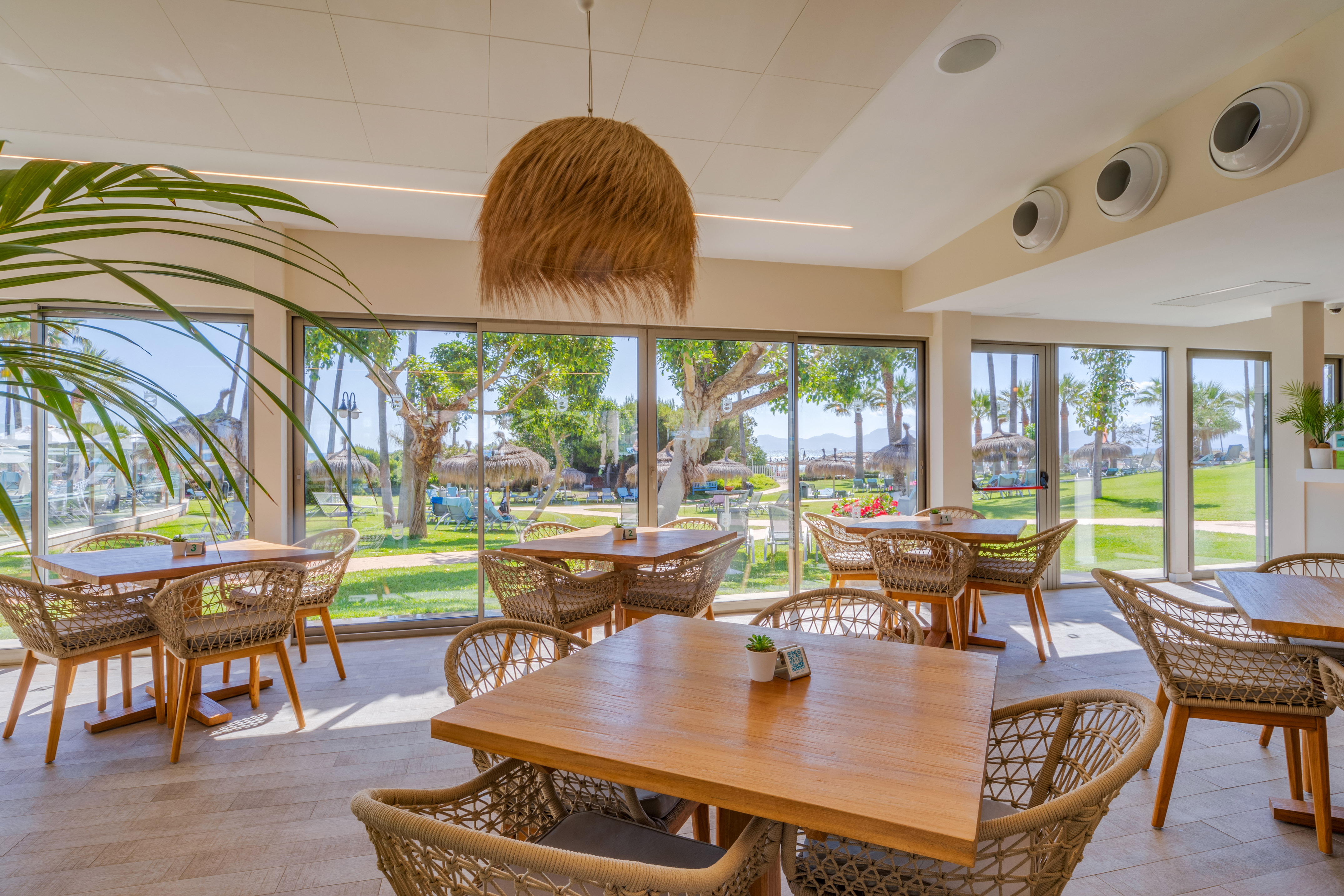 a room with tables and chairs