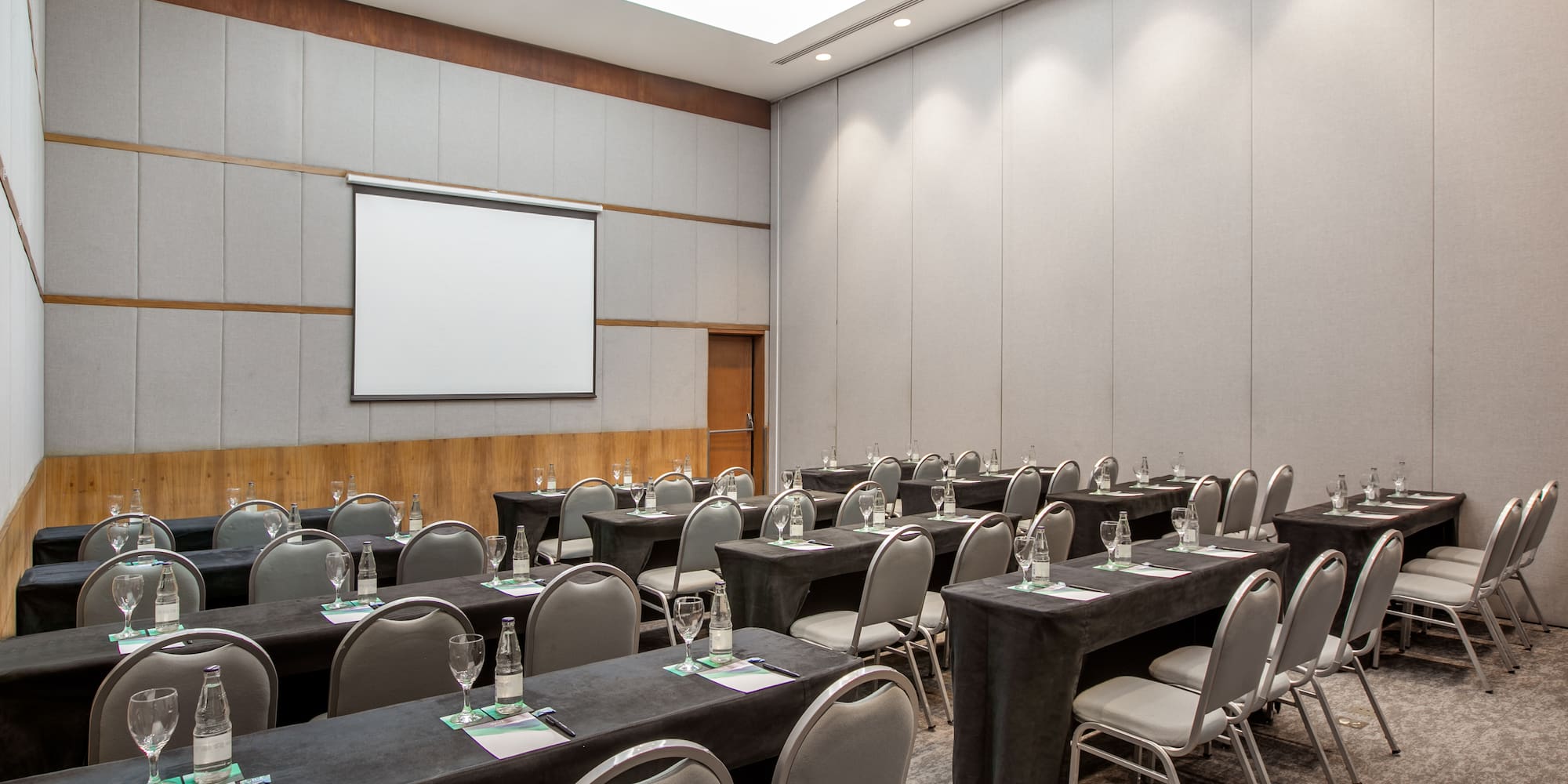 a room with tables and chairs