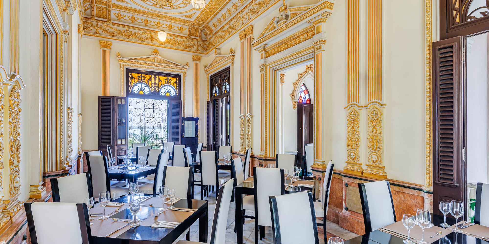 a room with tables and chairs