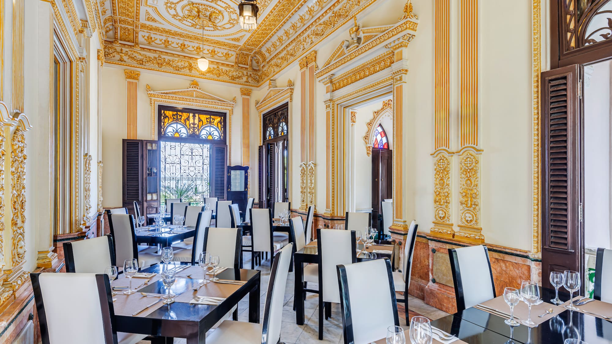 a room with tables and chairs