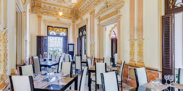 a room with tables and chairs