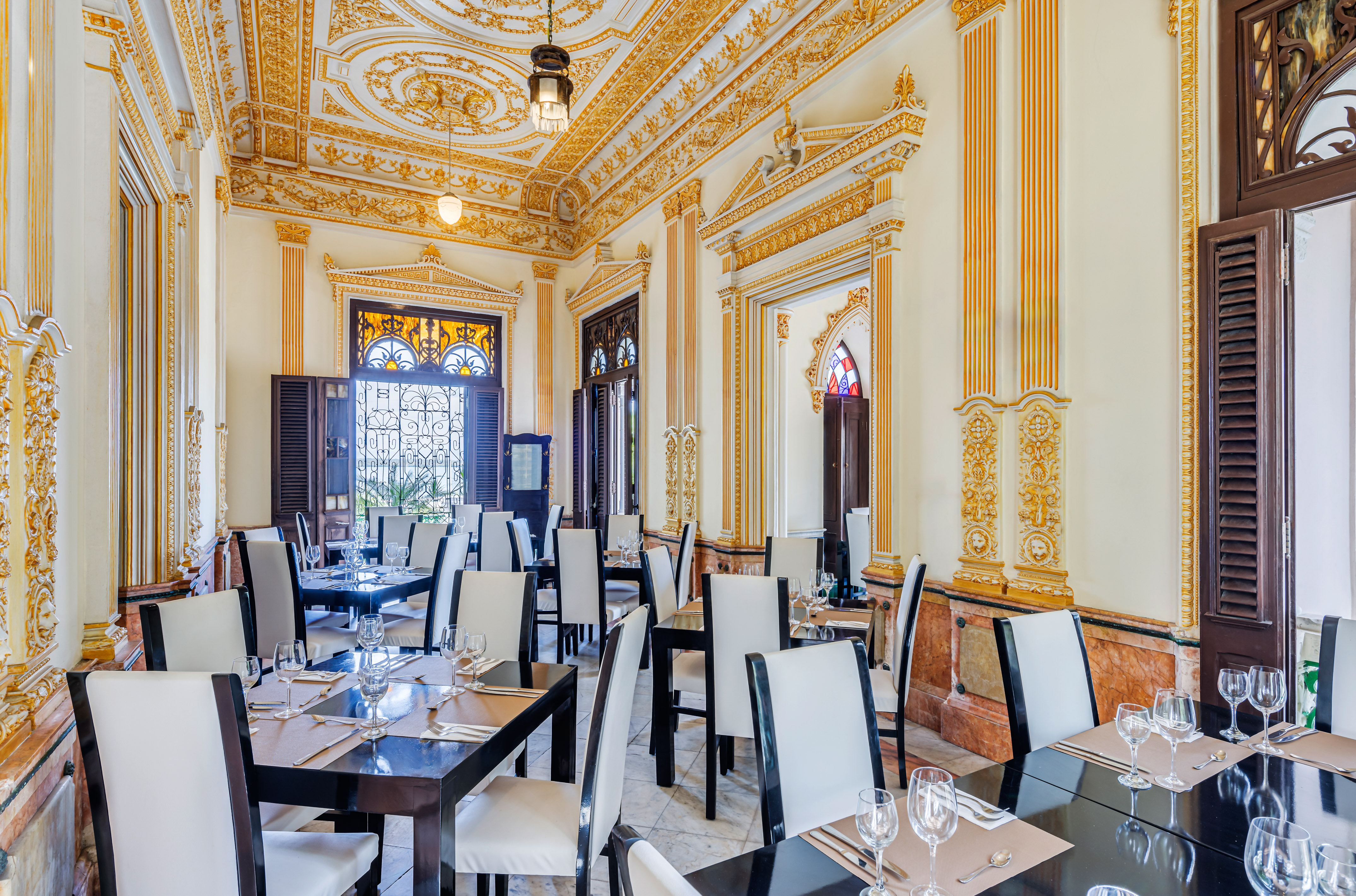 a room with tables and chairs