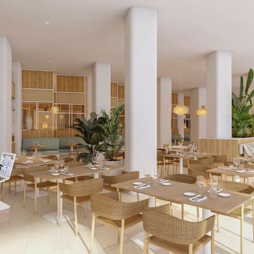 a room with tables and chairs