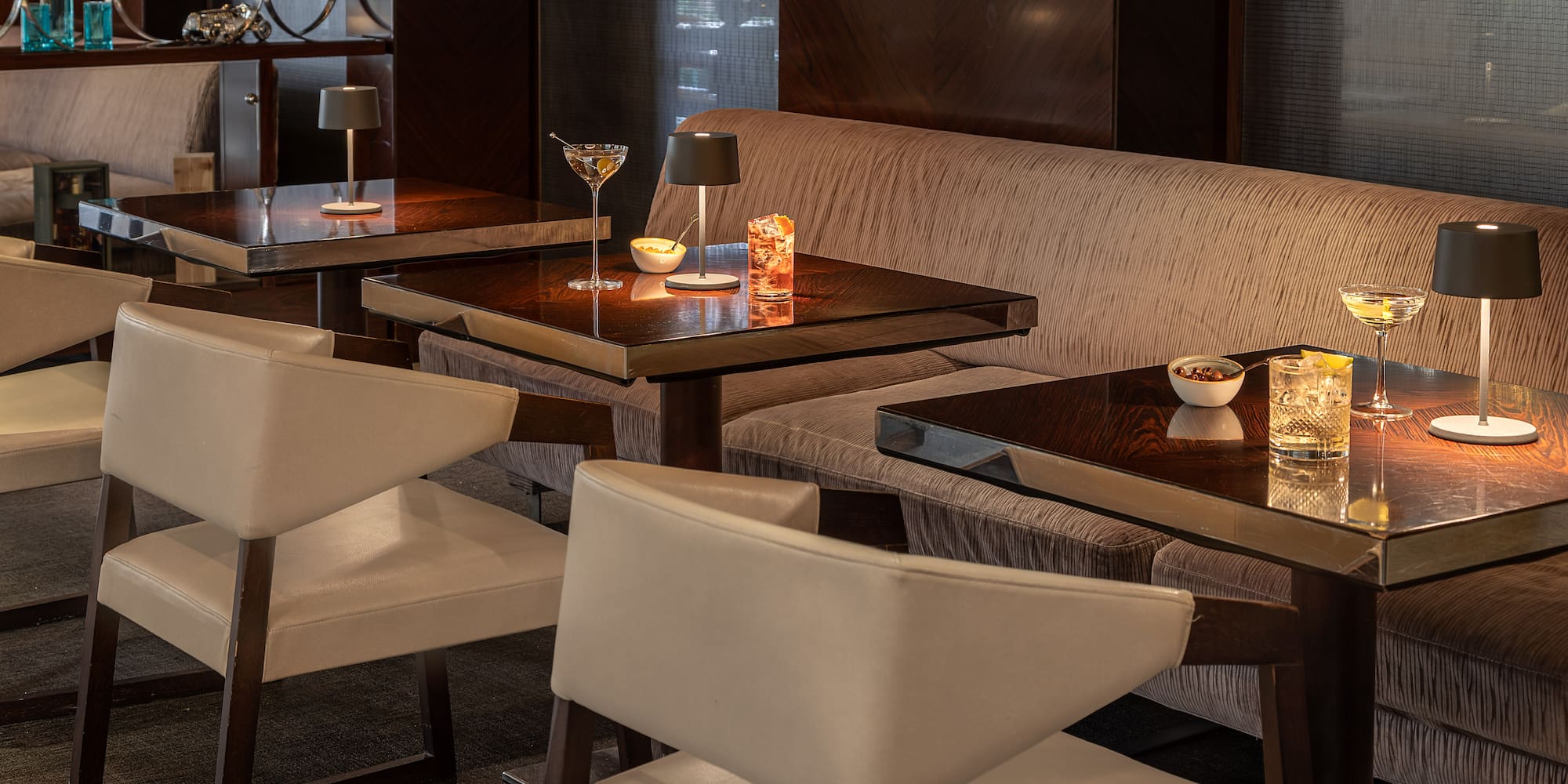 a table with candles and a couch