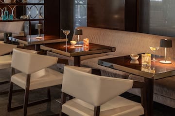 a table with candles and a couch