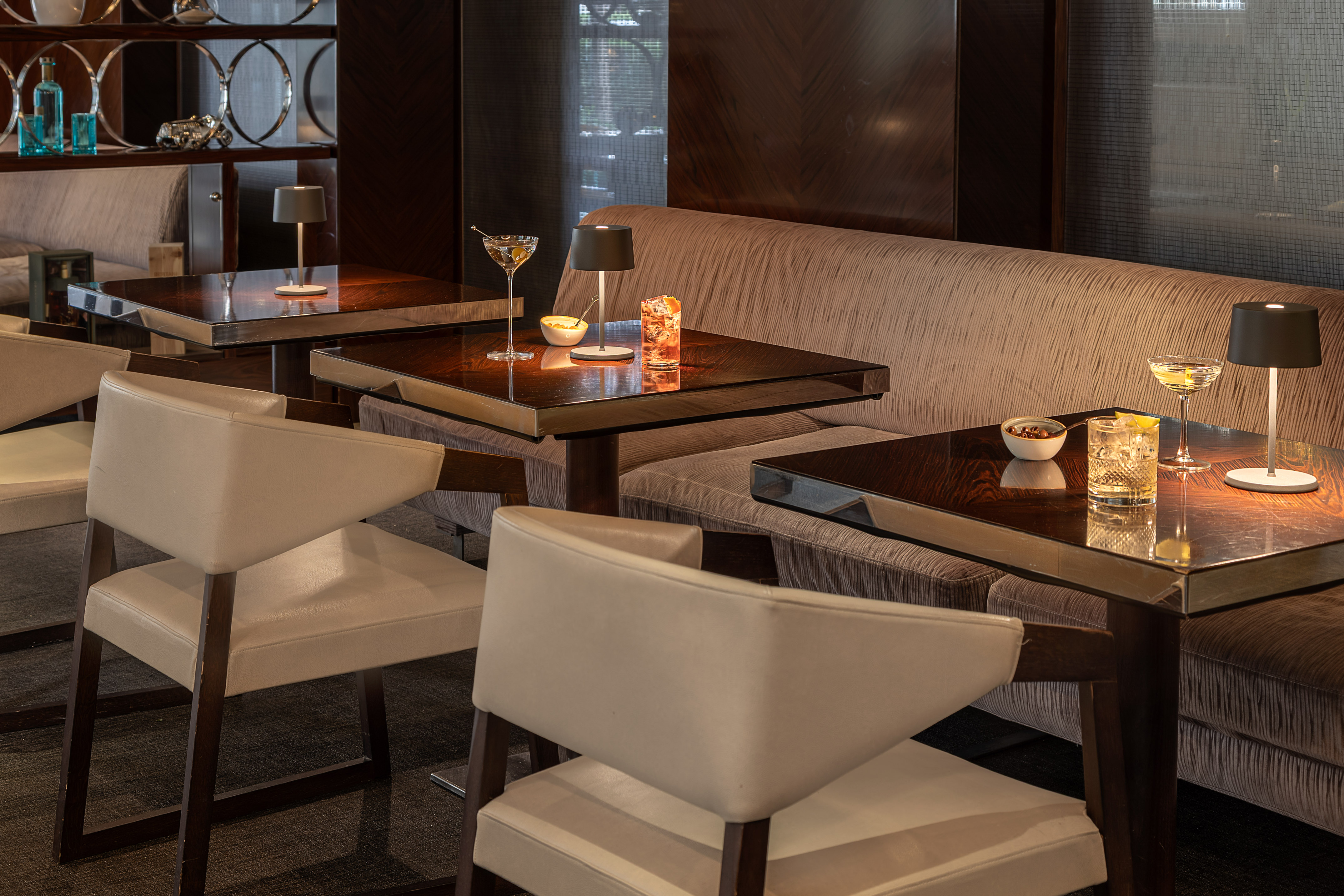 a table with candles and a couch