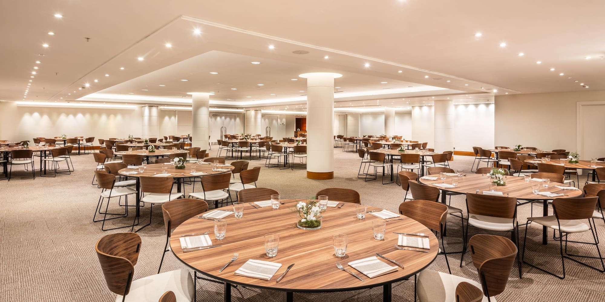 a room with tables and chairs