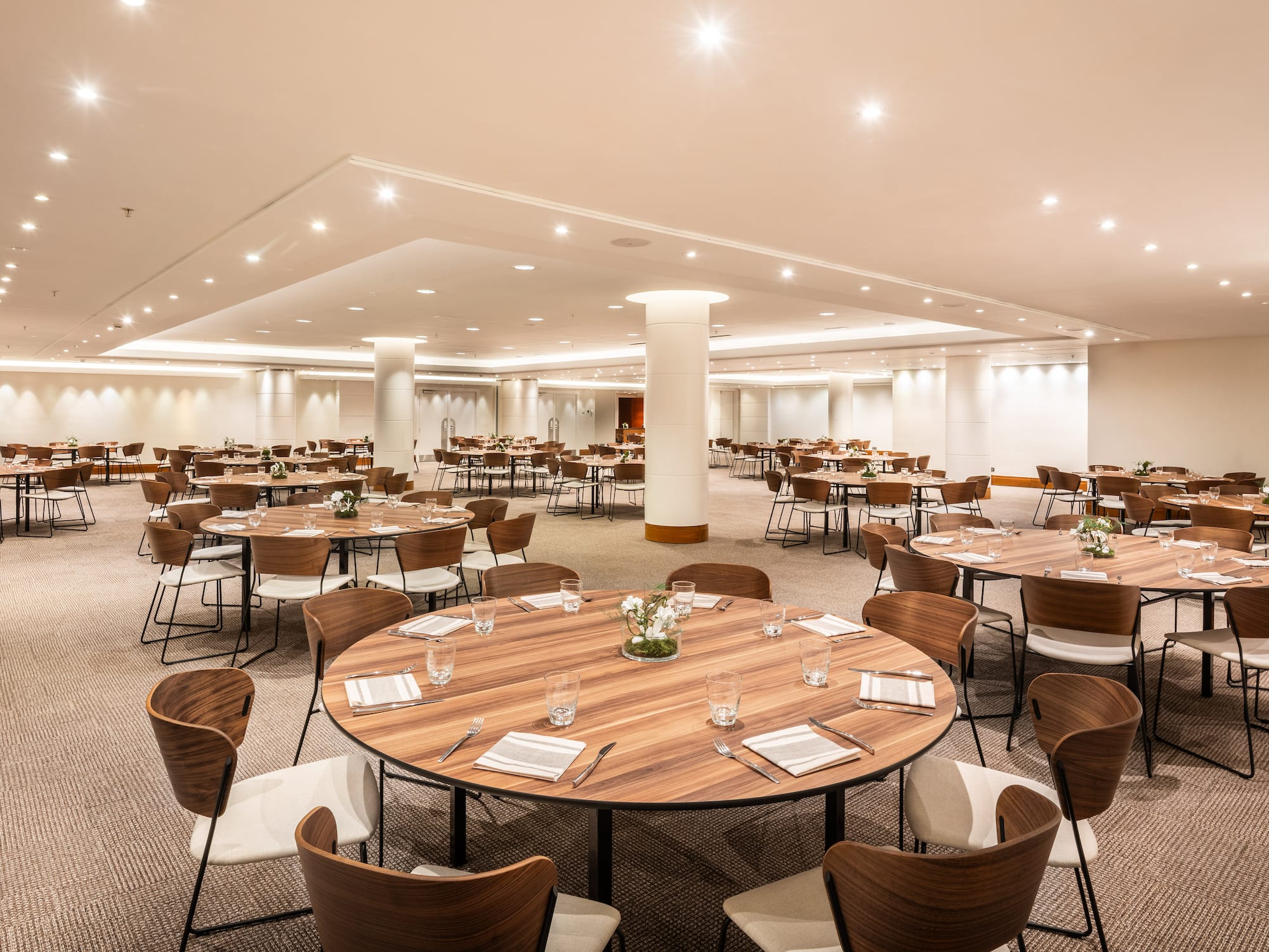 a room with tables and chairs