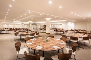 a room with tables and chairs