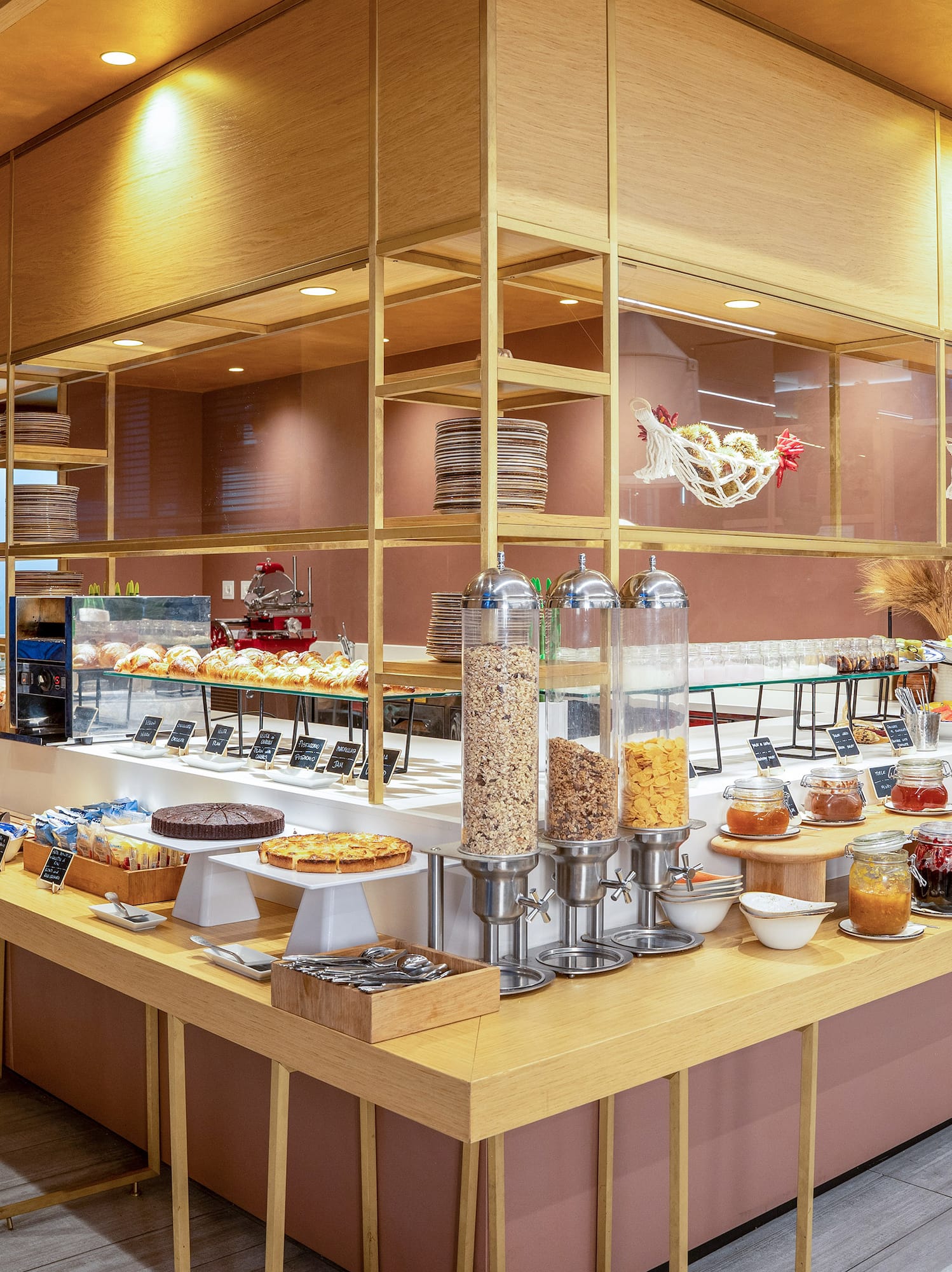 a food buffet with a variety of food items on the counter