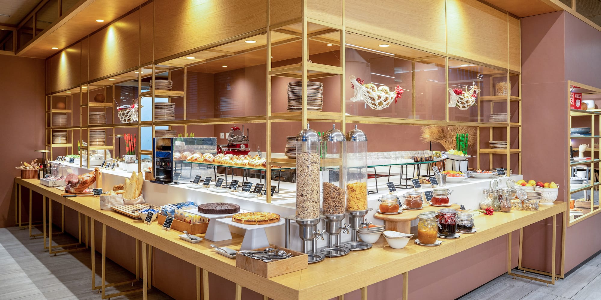 a food buffet with a variety of food items on the counter