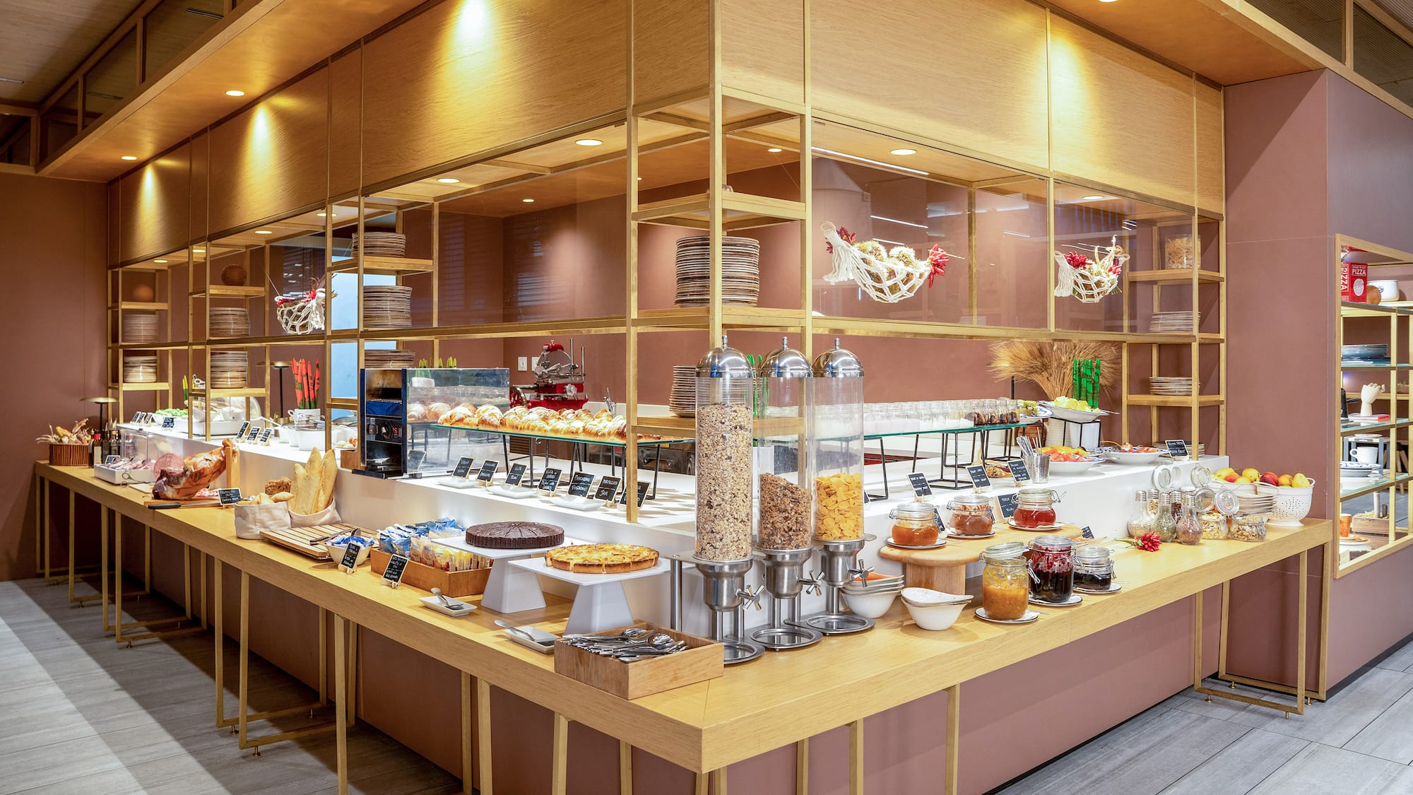 a food buffet with a variety of food items on the counter