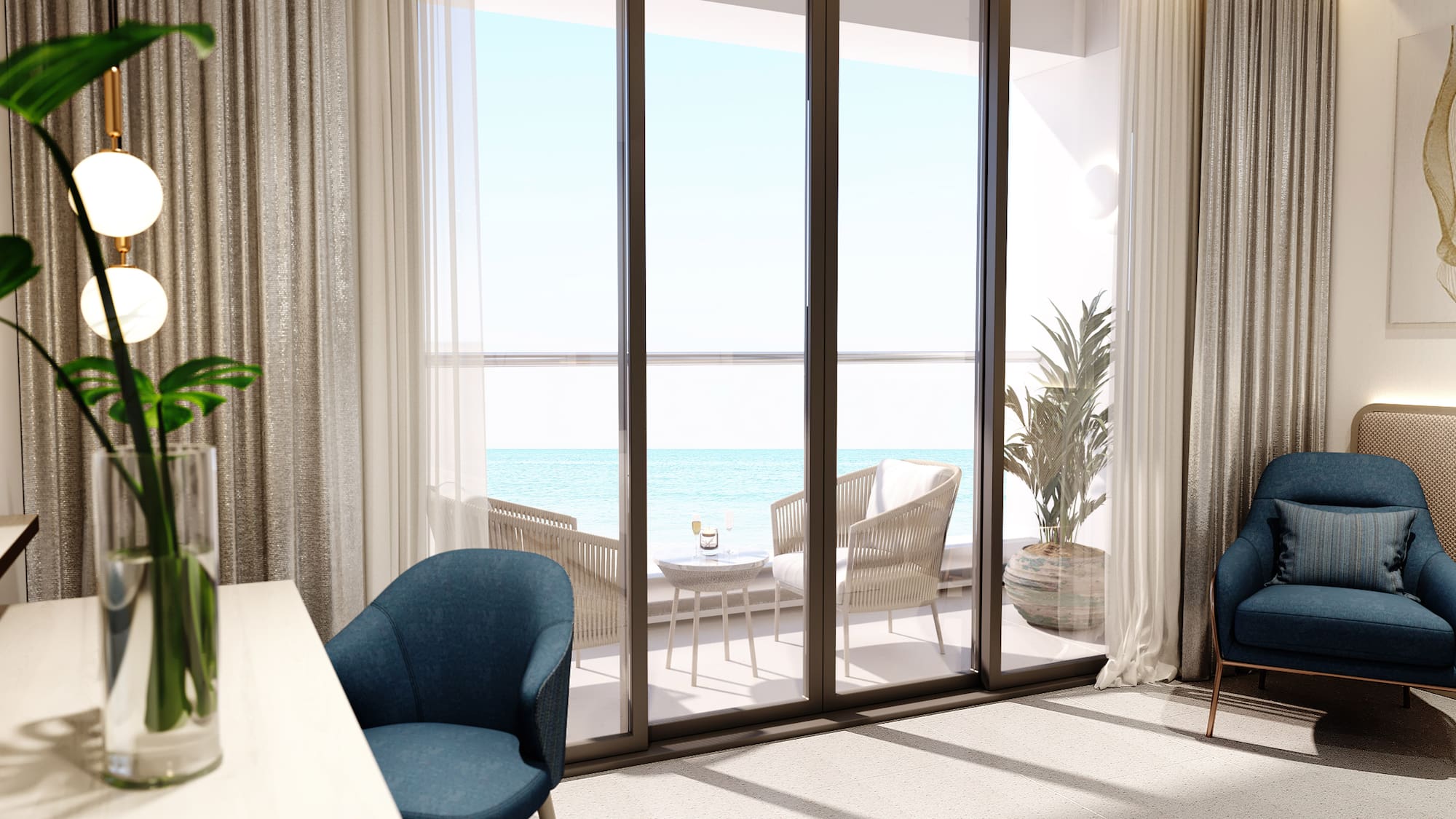 a room with a table and chairs and a table with chairs and a table with a view of the ocean