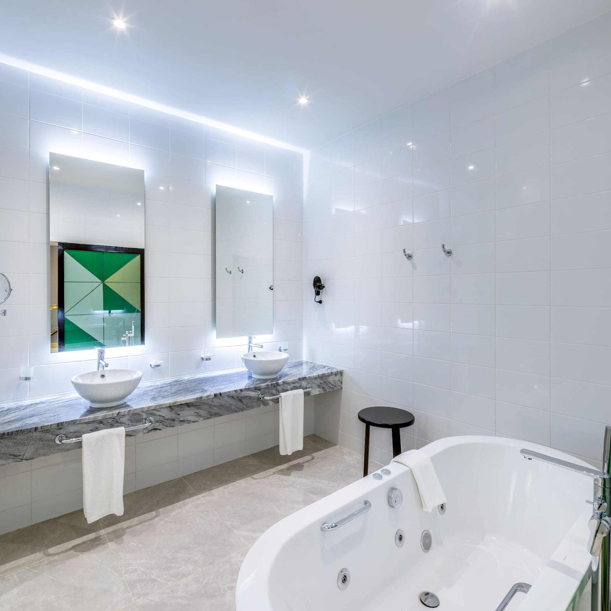 a bathroom with a tub and sink