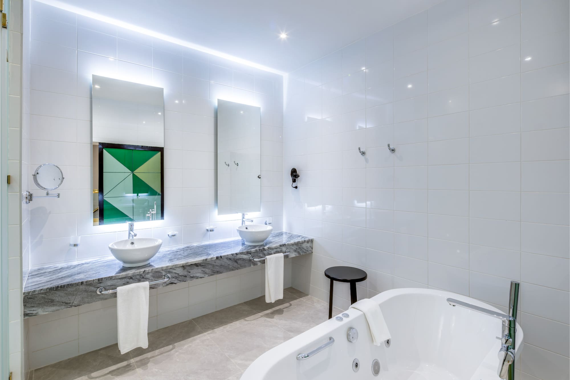 a bathroom with a tub and sink