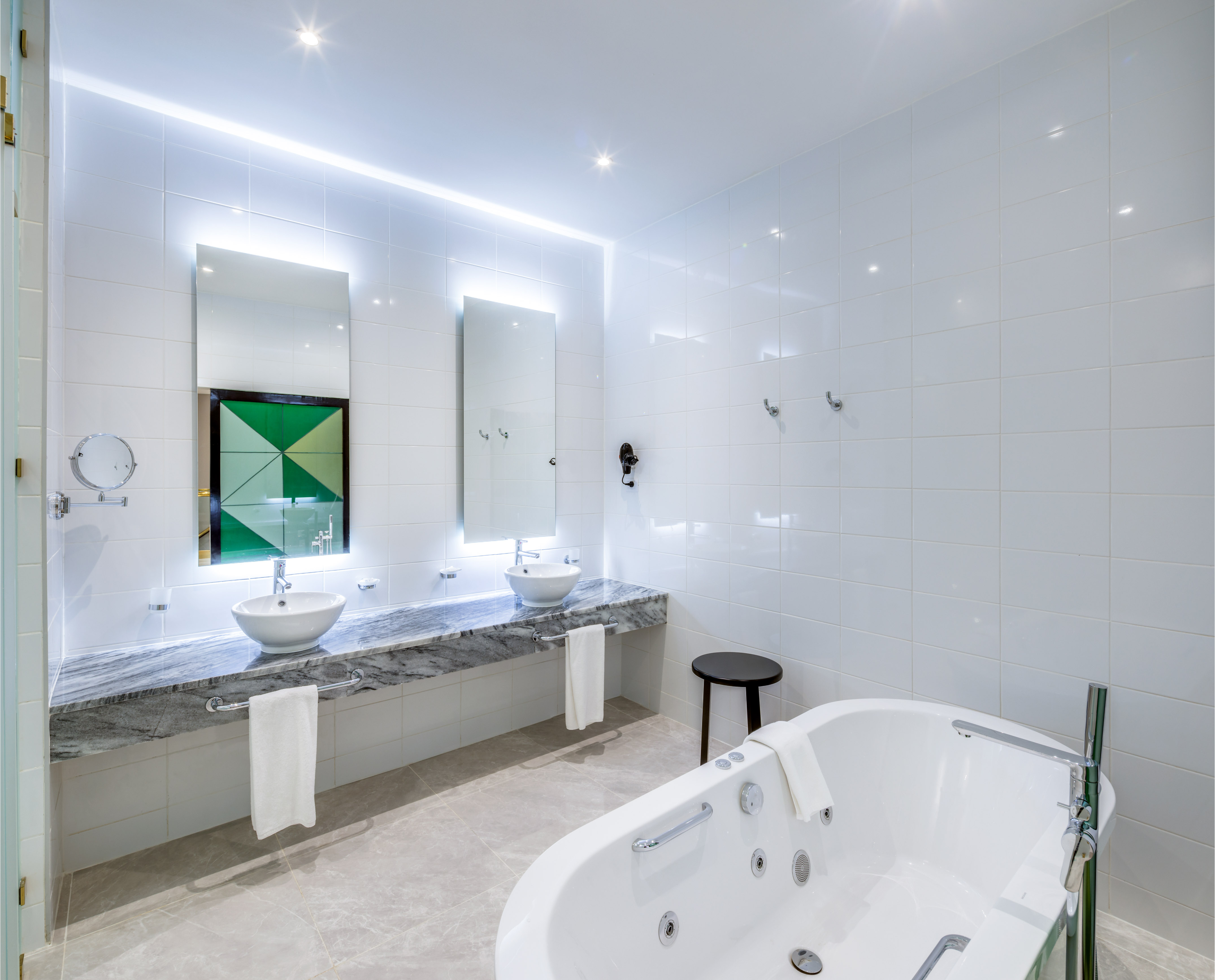 a bathroom with a tub and sink