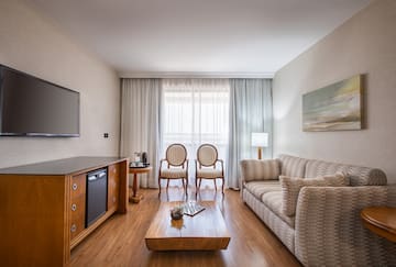 a living room with a couch and a tv