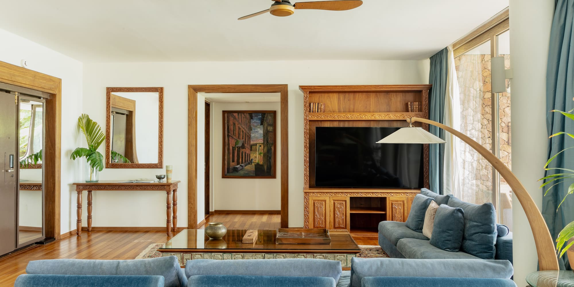 a living room with a couch and a tv