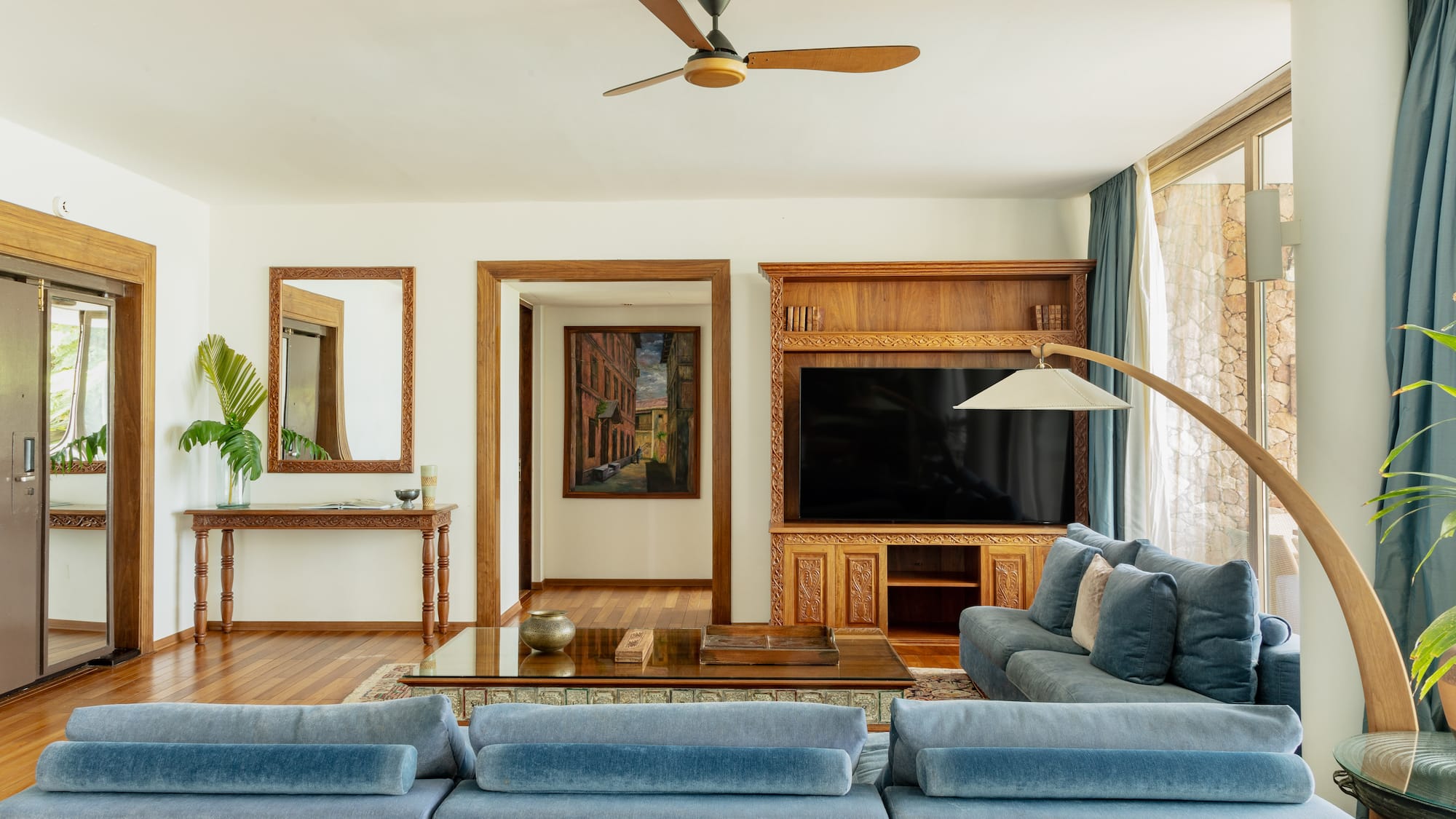 a living room with a couch and a tv