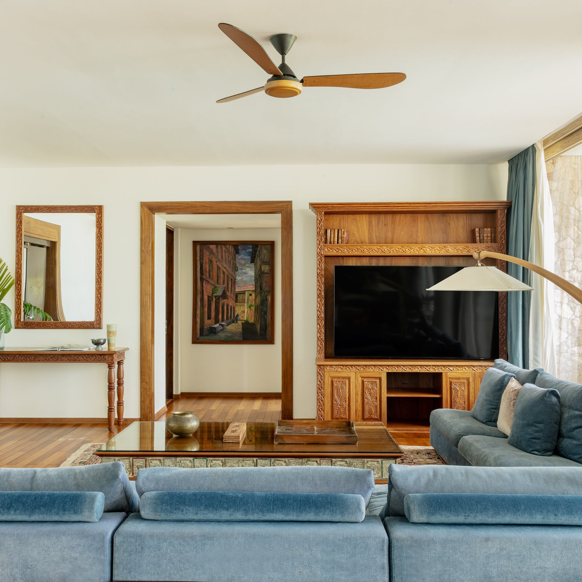 a living room with a couch and a tv