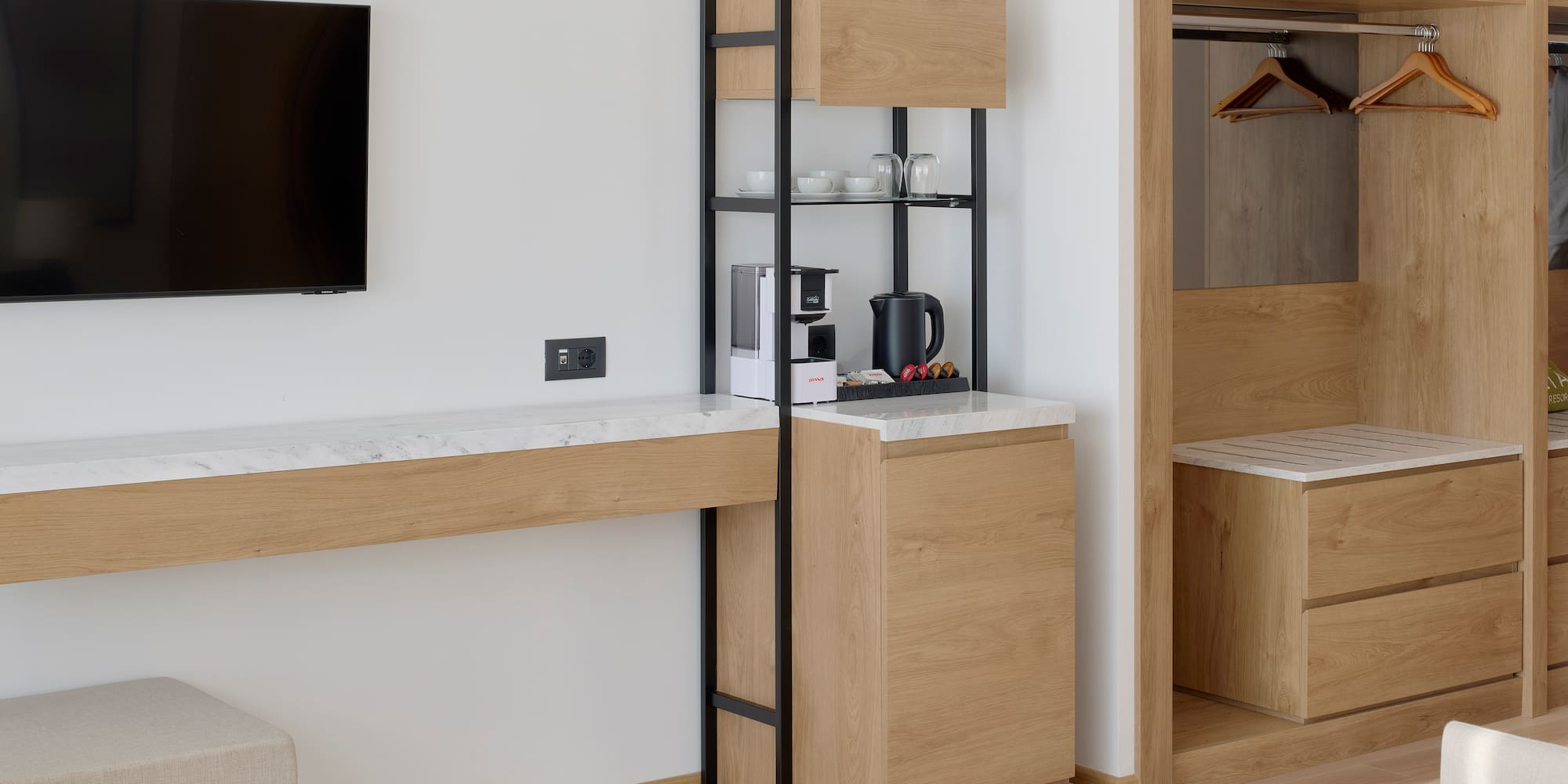 a room with a tv and a shelf