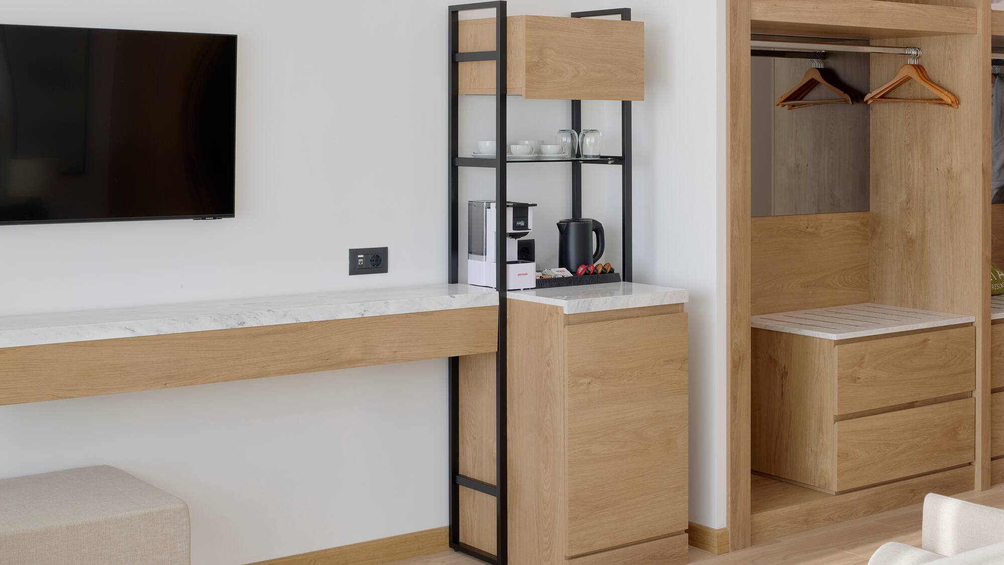 a room with a tv and a shelf