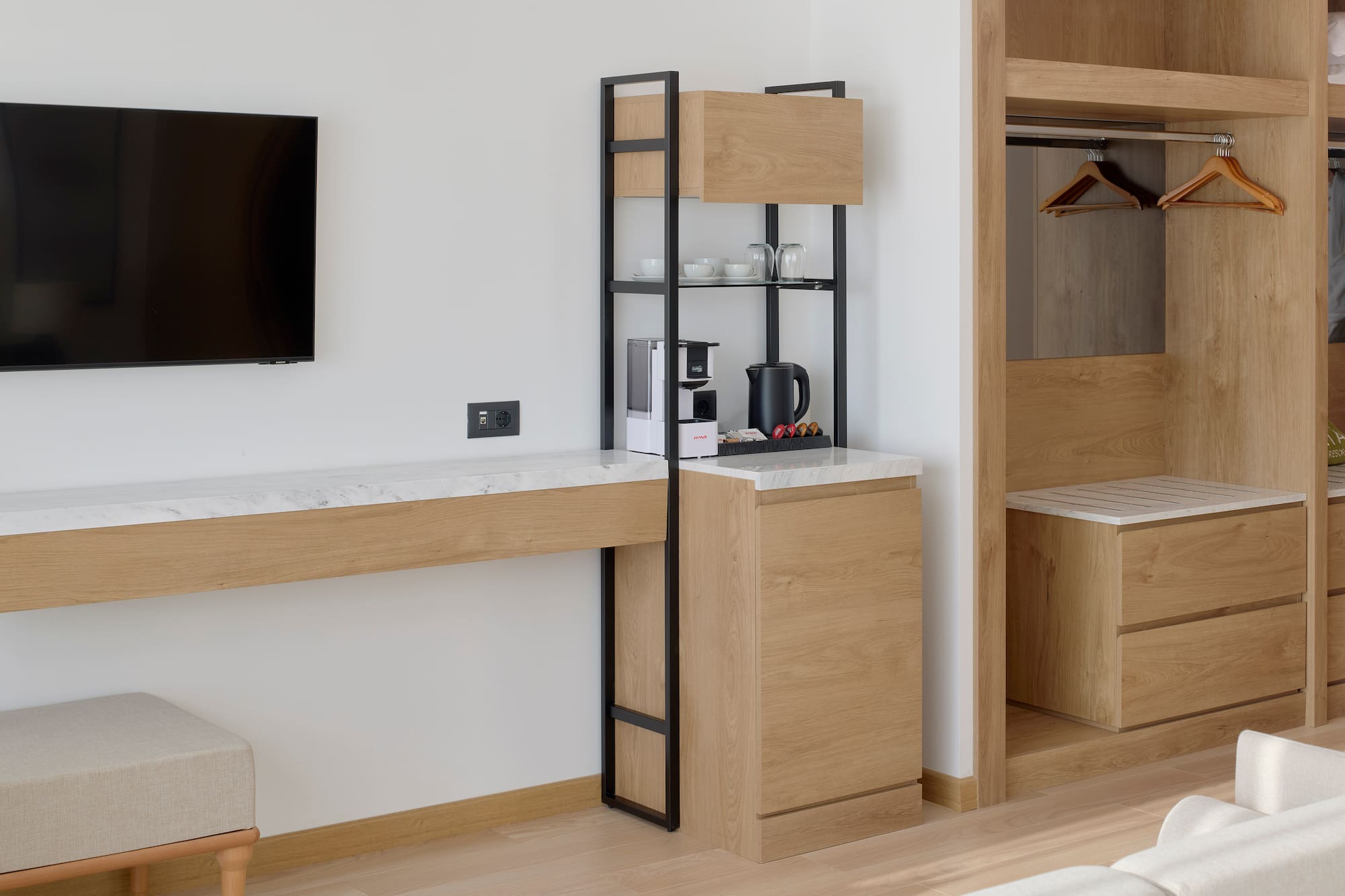 a room with a tv and a shelf