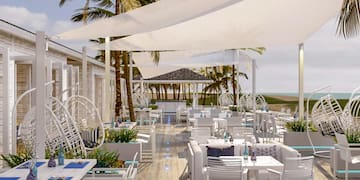 a restaurant with tables and chairs