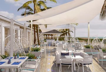 a restaurant with tables and chairs