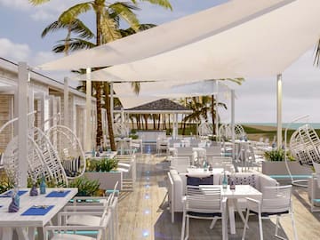 a restaurant with tables and chairs