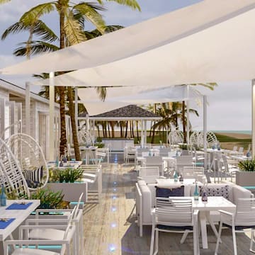 a restaurant with tables and chairs