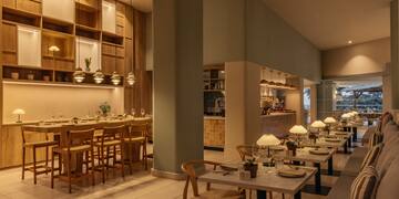 a restaurant with tables and chairs