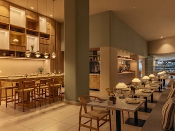 a restaurant with tables and chairs