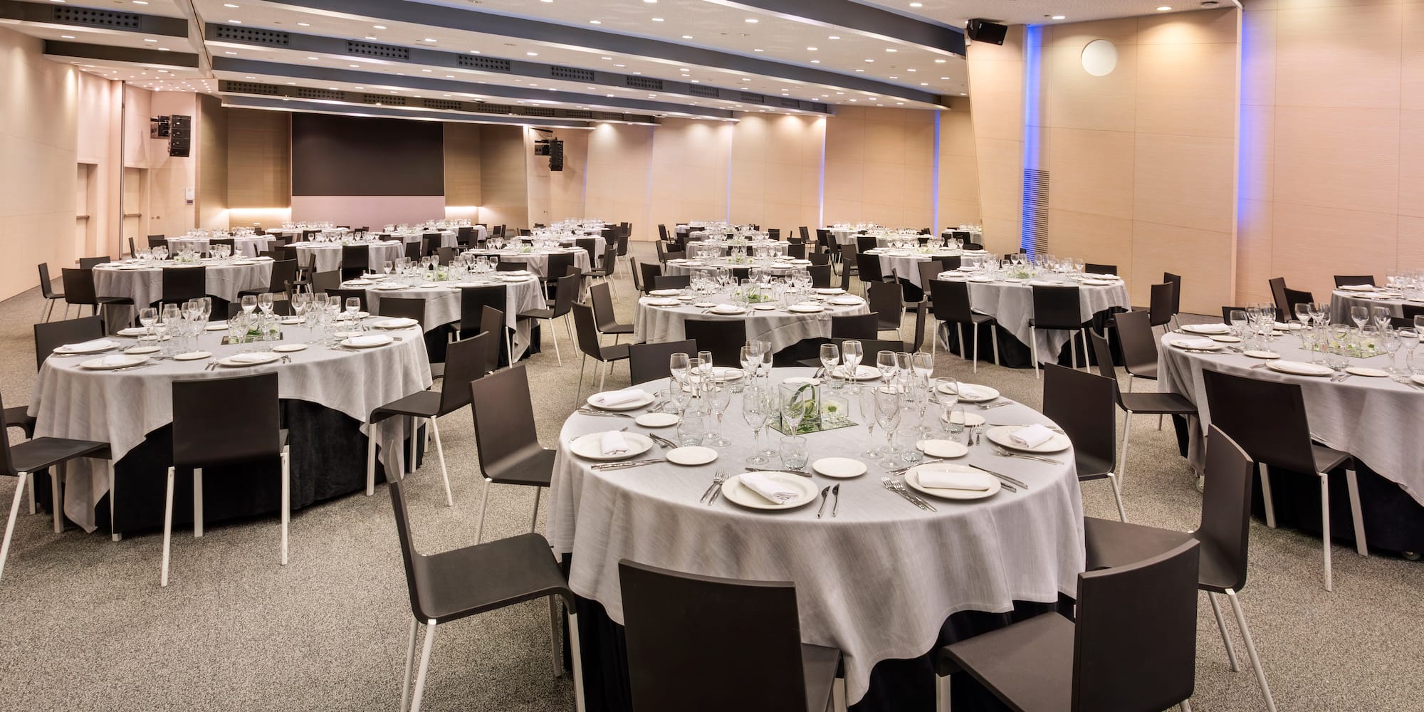 a room with tables and chairs