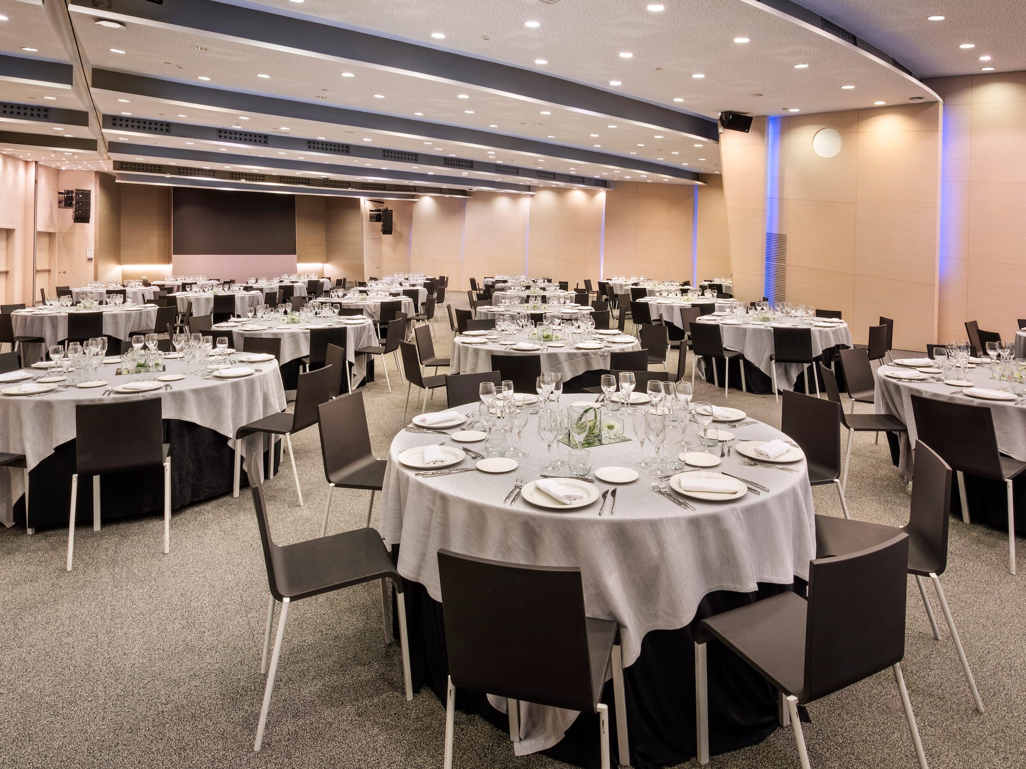 a room with tables and chairs