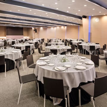 a room with tables and chairs