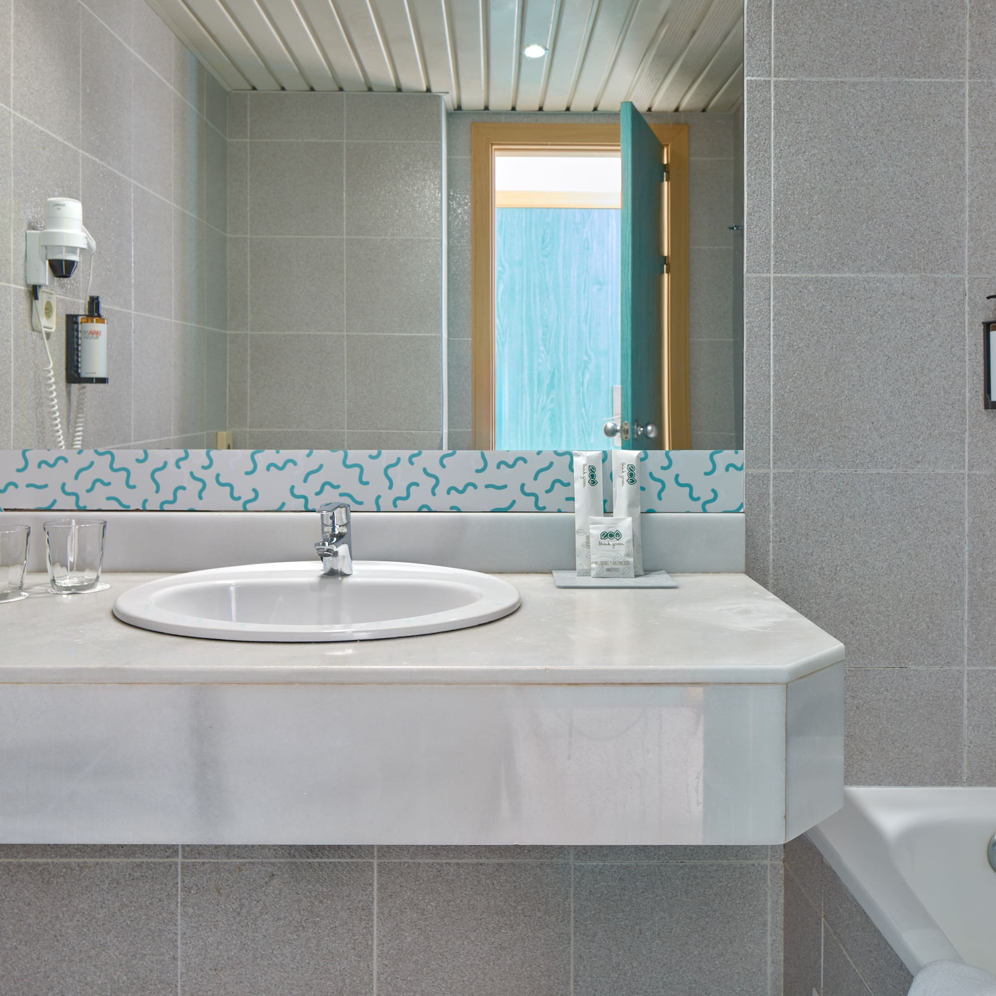 a bathroom with a sink and a tub