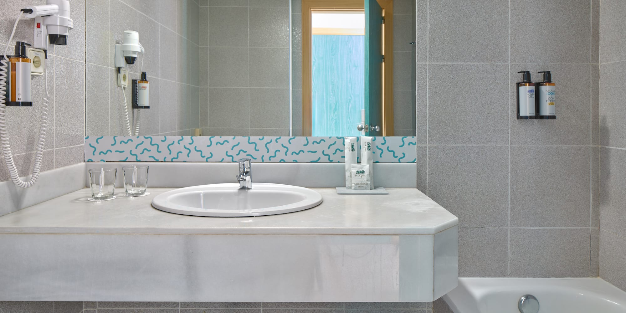 a bathroom with a sink and a tub