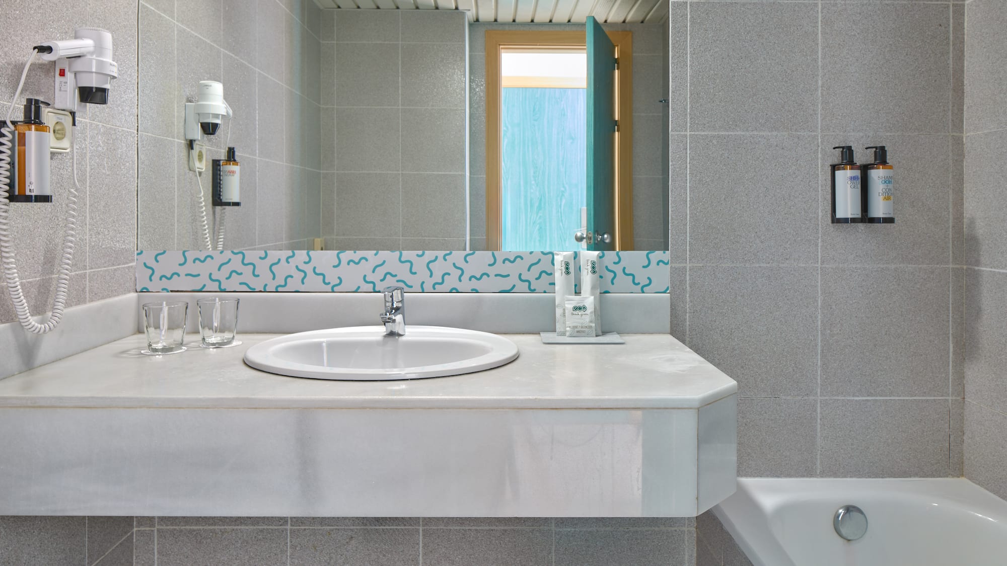 a bathroom with a sink and a tub