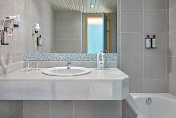 a bathroom with a sink and a tub