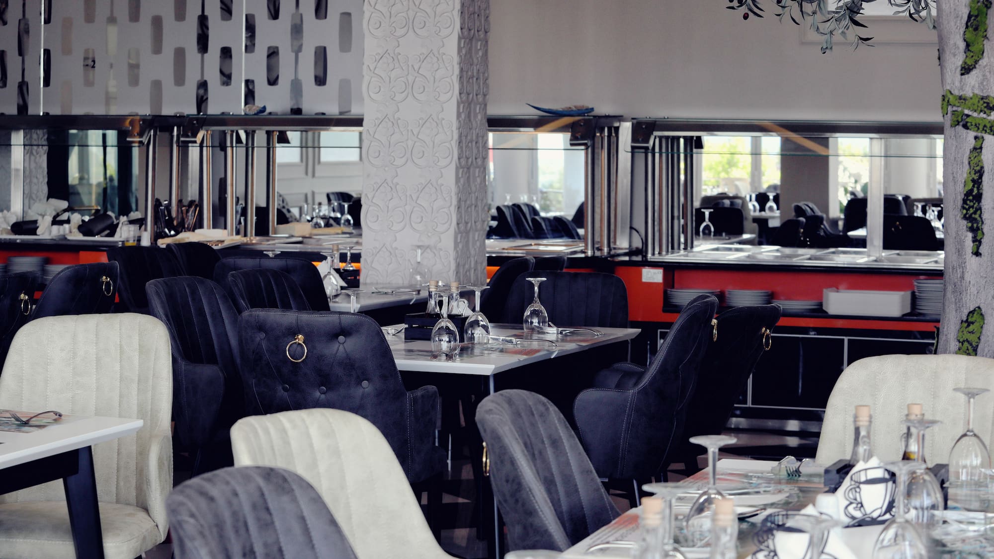 a restaurant with tables and chairs