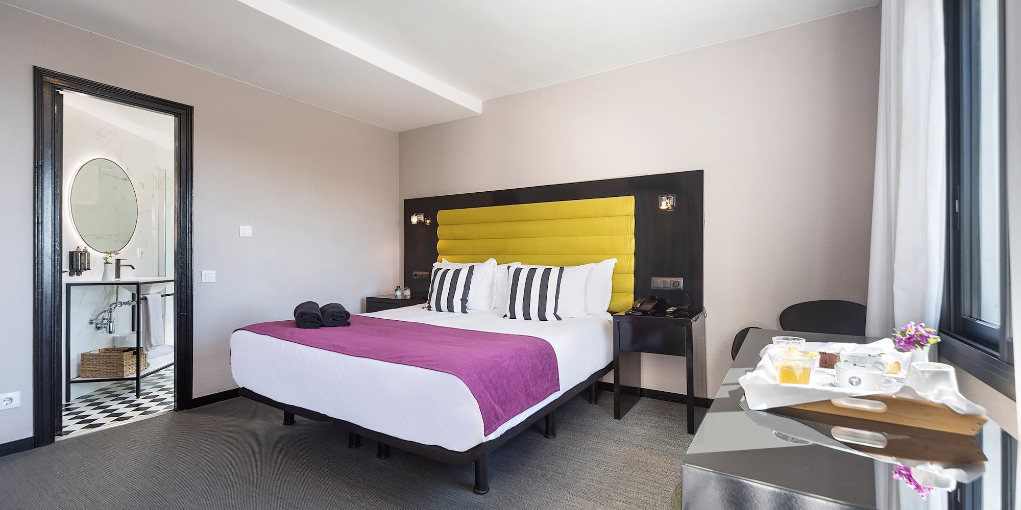 a room with a bed and a table