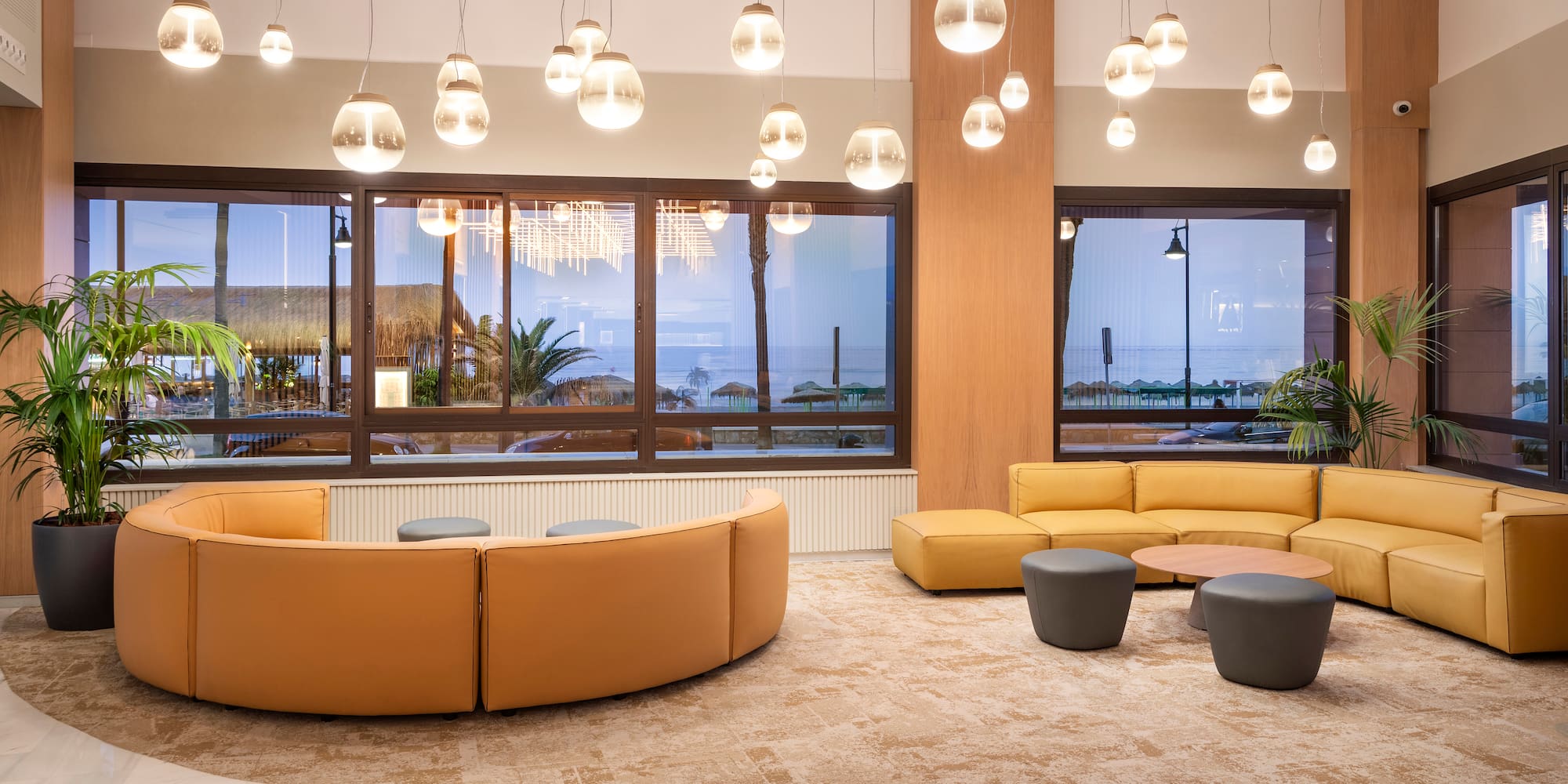 a room with couches and tables