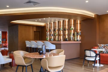 a room with a table and chairs