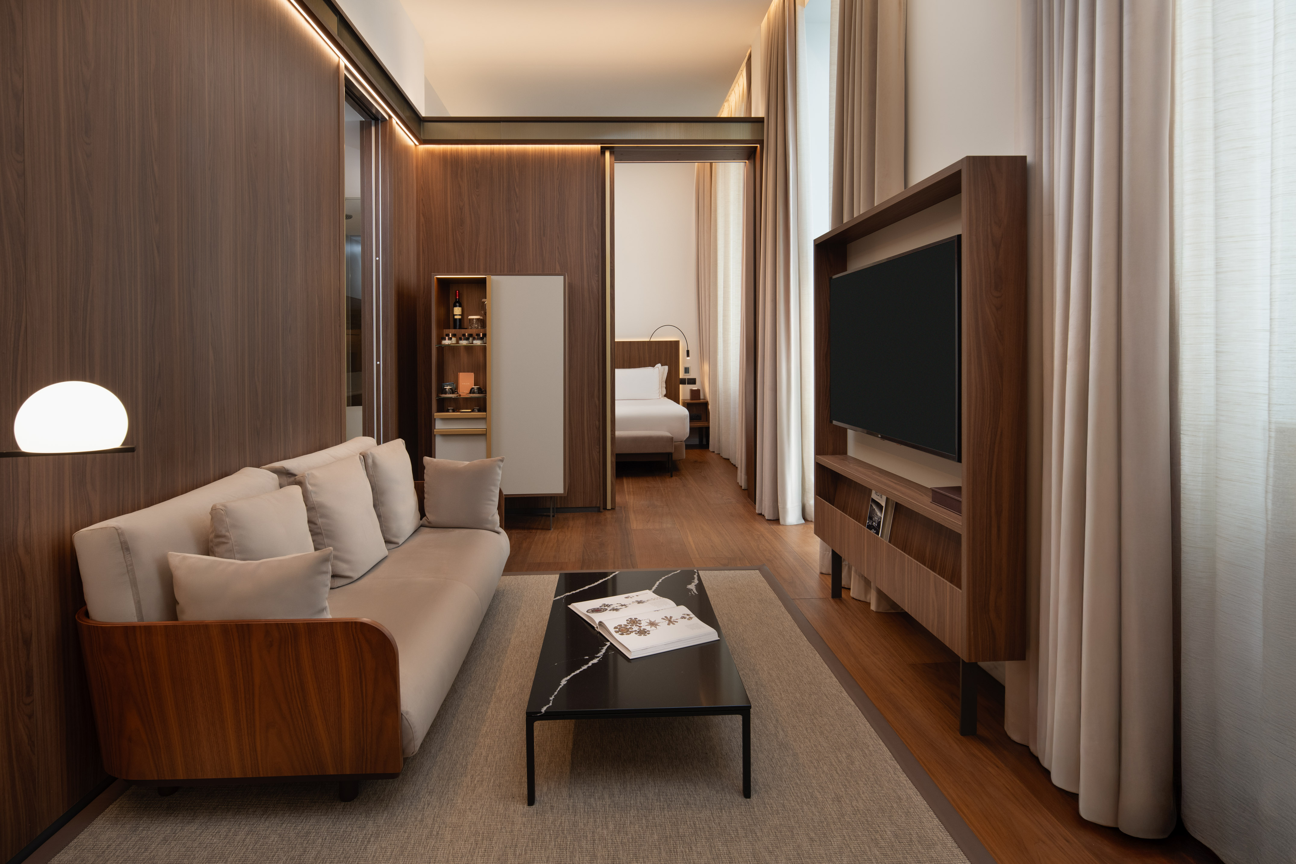 a room with a couch and a tv